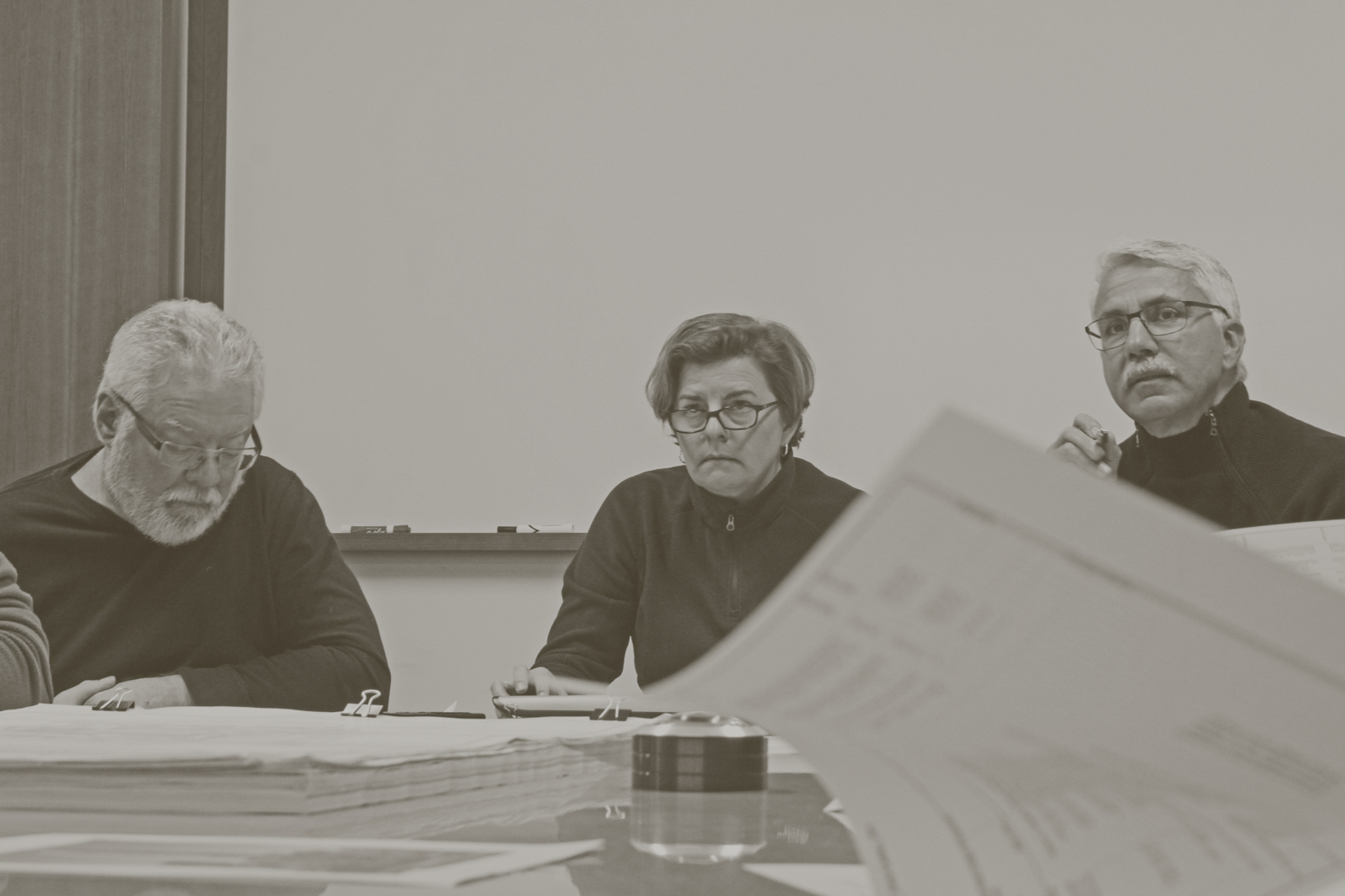 Team sitting at conference table